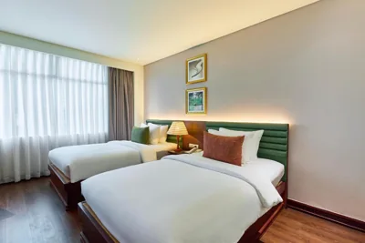 Deluxe Twin con ventana, té de la tarde gratis — KiN Hotel Thi Sach Edition